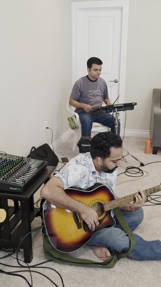 Guitarist and drummer playing together